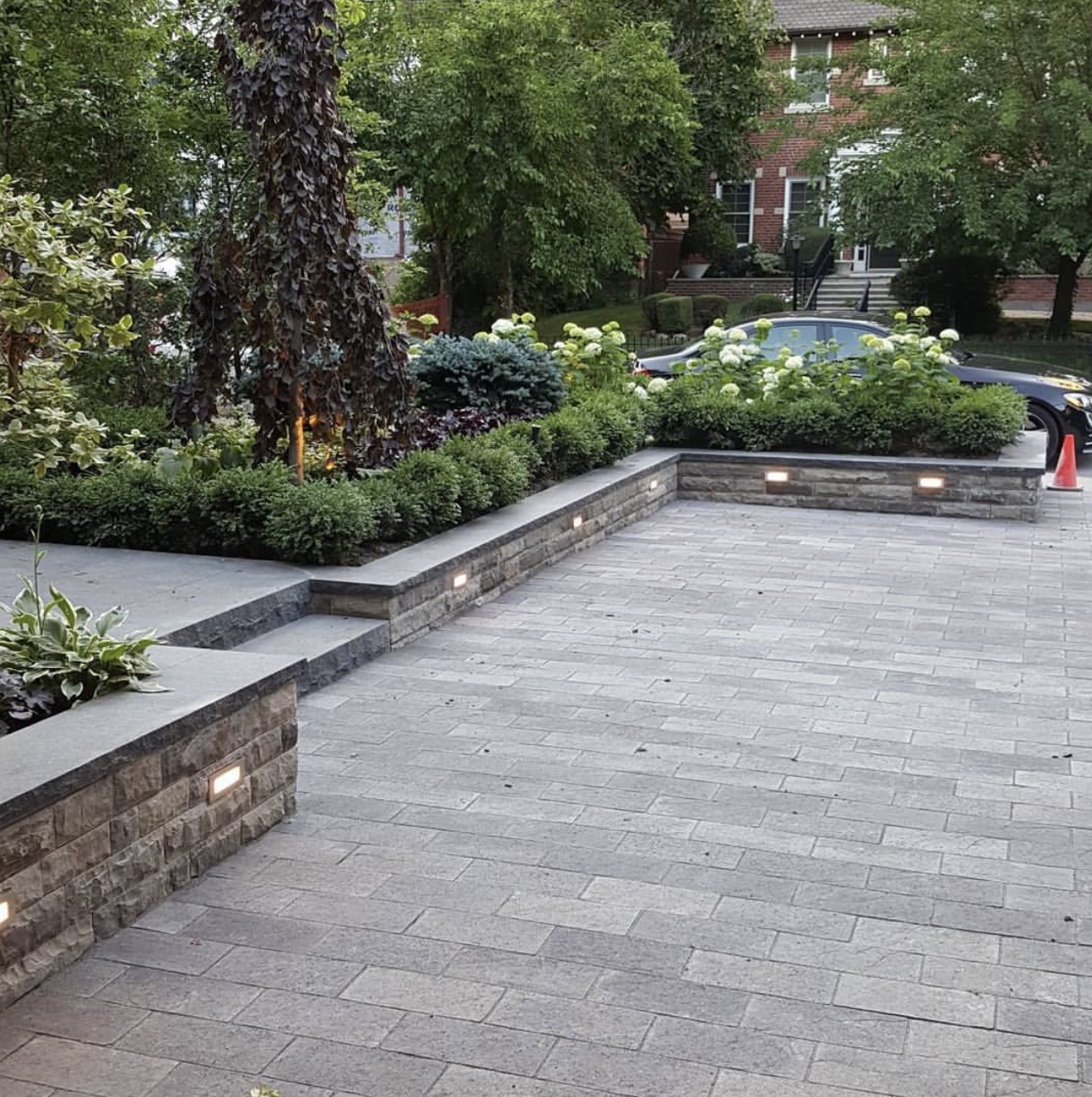 Landscape lighting on stone retaining walls